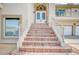 Brick staircase leading to grand double doors at 380 Claremont St, Boulder City, NV 89005