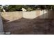 View of a small, unlandscaped backyard at 2021 San Simeon St, Las Vegas, NV 89108