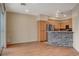 Kitchen features light wood cabinets and a stone breakfast bar at 5648 Ancient Agora St, North Las Vegas, NV 89031