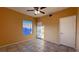 Well-lit bedroom with tile floors and large window at 2020 Rancho Lake Dr # 205, Las Vegas, NV 89108