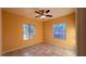 Bright bedroom with tile flooring and ceiling fan at 2020 Rancho Lake Dr # 205, Las Vegas, NV 89108