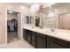 Double vanity bathroom with a walk-in shower at 6329 Supernova Hill St, North Las Vegas, NV 89031