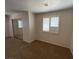 Bright bedroom with neutral walls and plantation shutters at 730 Goshawk St, Henderson, NV 89015