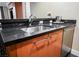 Sleek kitchen with stainless steel sink and granite countertop at 2000 N Fashion Show Dr # 4822, Las Vegas, NV 89109