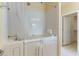 Accessible bathroom with walk-in shower and bathtub at 7925 Fantail Dr, North Las Vegas, NV 89084