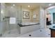 Elegant bathroom with soaking tub and walk-in shower at 145 E Harmon Ave # 1908, Las Vegas, NV 89109