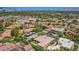 Aerial view showcasing a house, pool, and the surrounding neighborhood and city views at 2951 Aruba Ct, Las Vegas, NV 89121