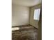 Small bedroom with wood-look flooring and window at 4848 Califa Dr, Las Vegas, NV 89122