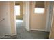 Hallway with open door to bedroom and window at 6528 Chebec St, North Las Vegas, NV 89084