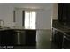 Spacious kitchen featuring granite countertops and stainless steel appliances at 6528 Chebec St, North Las Vegas, NV 89084