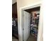 Walk-in pantry offers ample storage space for groceries at 2409 W Gilmore Ave, North Las Vegas, NV 89032