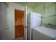 Laundry room with washer, dryer and access to other rooms at 780 S Lawson Dr, Moapa, NV 89025