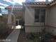 Covered porch entryway with walkway and landscaping at 529 Quail Bird Pl, Henderson, NV 89052