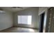 Spacious bedroom with large window and closet at 4774 Willow Glen Dr, Las Vegas, NV 89147