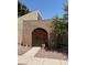 Ornate brown gate leading to a private area at 4217 Park Ct, Las Vegas, NV 89110