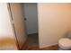 Small bathroom linen closet with carpeted flooring at 10021 Via Toro Ave, Las Vegas, NV 89117