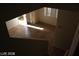 View of living room from upstairs showing tile flooring at 10021 Via Toro Ave, Las Vegas, NV 89117