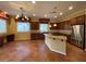 Kitchen with granite island, stainless steel appliances, and custom cabinetry at 4565 Riva De Romanza St, Las Vegas, NV 89135