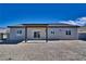 House backyard with covered patio and gravel at 5130 Valero Ct, Pahrump, NV 89060