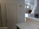 Clean and simple bathroom with a single door at 3401 Conan St # 103, Las Vegas, NV 89129