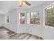 Bright living room featuring vinyl wood flooring and large windows at 813 Mesquite Springs Dr # 101, Mesquite, NV 89027