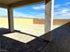 Covered patio overlooking a large, unlandscaped backyard at 7132 Port Stephens St, North Las Vegas, NV 89084