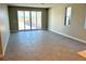 Spacious living area with sliding doors to patio at 7132 Port Stephens St, North Las Vegas, NV 89084