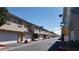 View of townhouses and parking area from the street at 1236 Dusty Creek St, Las Vegas, NV 89128