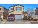 Two-story house with a red truck in the driveway at 1168 Aspen Cliff Dr, Henderson, NV 89011