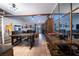 Open dining area with spiral staircase and wood table at 2841 Glendevon Cir, Henderson, NV 89014