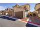 Attached garage with additional parking space at 52 Kimberlite Dr, Henderson, NV 89011