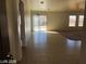 Bright living room with tile floors and sliding glass door at 1083 Sterling Peak St, Las Vegas, NV 89110