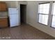 Kitchen area with white appliances and tile floor at 1083 Sterling Peak St, Las Vegas, NV 89110