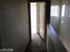 Upper hallway with carpet and access to bedrooms at 11882 Snow Bank St, Las Vegas, NV 89183