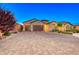 Two-car garage and brick driveway at 593 Desert Bluebell Ct, Henderson, NV 89011