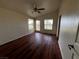 Bedroom with wood-look floors and ceiling fan at 880 Montecito Dr, Pahrump, NV 89048