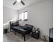 Simple bedroom with a full-size bed, nightstand, and ceiling fan at 3104 Dillon Ave, North Las Vegas, NV 89030