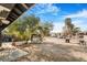 Large backyard with gravel and mature trees at 3104 Dillon Ave, North Las Vegas, NV 89030