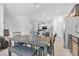 Kitchen dining area with table and bench seating at 10664 Sariah Skye Ave, Las Vegas, NV 89166