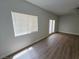 Bright living room with hardwood floors and french doors at 8301 Boseck Dr # 119, Las Vegas, NV 89145