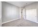 Well-lit bedroom with carpet, window with shutters, and closet at 8864 La Manga Ave, Las Vegas, NV 89147