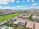 Overhead view featuring a well-planned community with parks and mountain range in the background at 2130 Danzinger Pl, Henderson, NV 89044