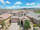 Well-maintained two-story home featuring desert landscaping and scenic mountain views at 2130 Danzinger Pl, Henderson, NV 89044