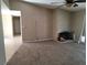 Living room with fireplace and neutral color palette at 2337 N Michael Way, Las Vegas, NV 89108