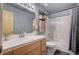 Clean bathroom with a tub, shower, and wood vanity at 2725 S Nellis Blvd # 2023, Las Vegas, NV 89121