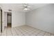 Bedroom with tile floors and access to hallway at 3131 Key Largo Dr # 104, Las Vegas, NV 89120