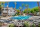 Community pool with lounge chairs at 3131 Key Largo Dr # 104, Las Vegas, NV 89120