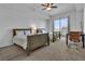 Spacious bedroom with two twin beds, a desk, and city view at 8255 Las Vegas Blvd # 719, Las Vegas, NV 89123