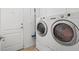 Convenient laundry room with side-by-side washer and dryer at 7364 Salvadora Pl, Las Vegas, NV 89113