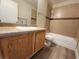 Clean bathroom with single sink vanity, bathtub, and tile flooring at 8600 W Charleston Blvd # 2025, Las Vegas, NV 89117